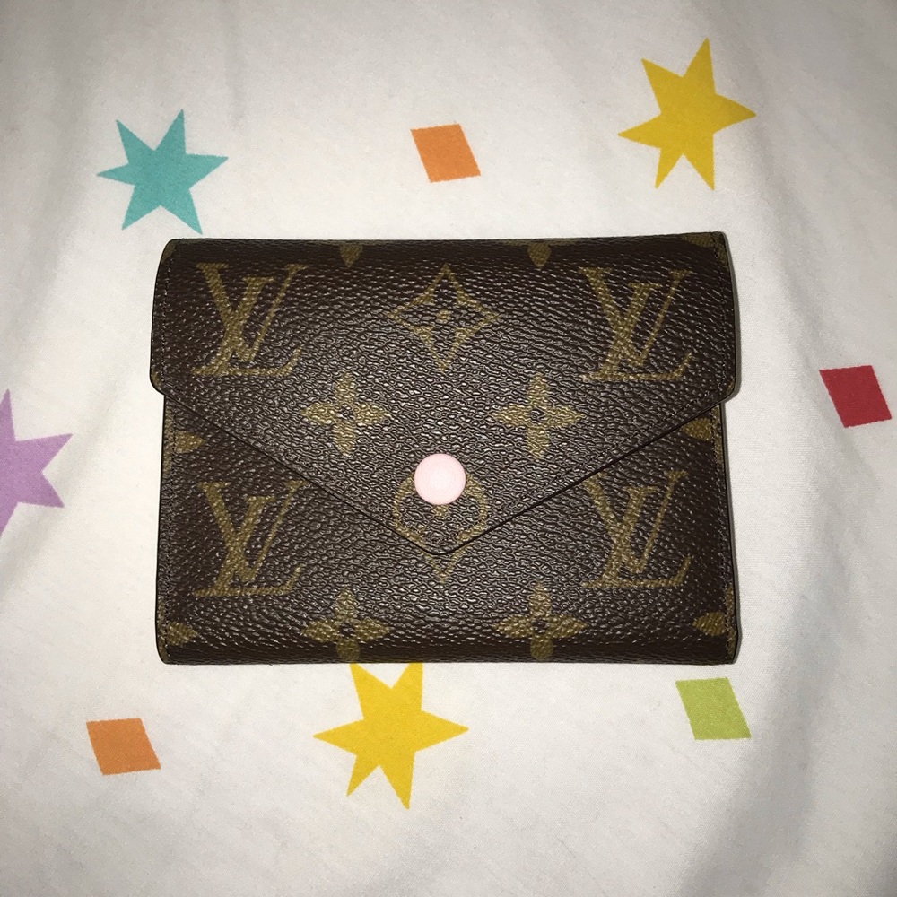 Louis Vuitton Victorine wallet in monogram w/ pink